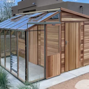 Empty Alton Fusion Greenhouse Shed with a door on each side as well as an interior door