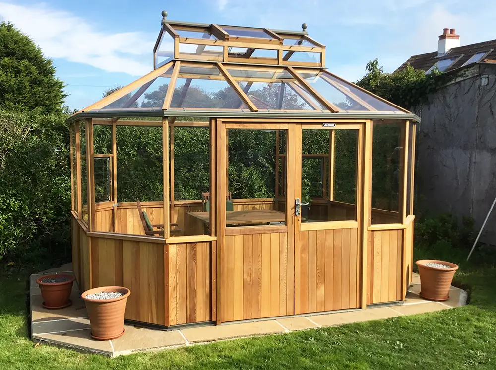 Frontal view of the Alton Octagonal Greenhouse with doors closed