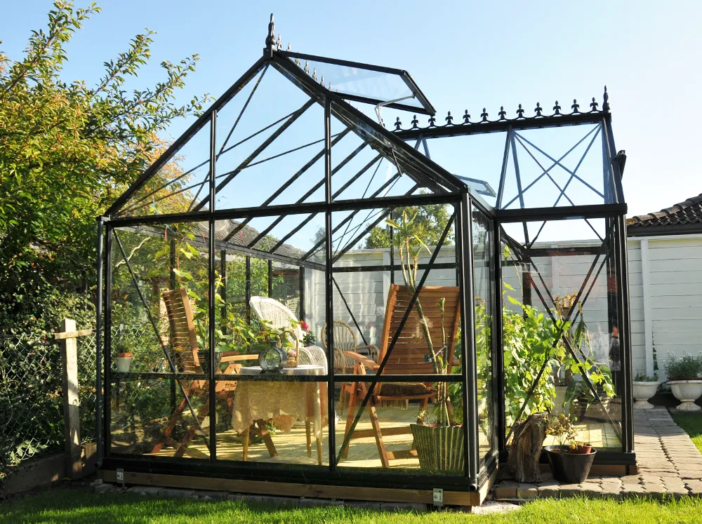 Summer shot of the Janssens Junior Victorian Orangerie with clear glass