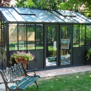 Janssens Retro Victorian Greenhouse in a backyard with art studio inside