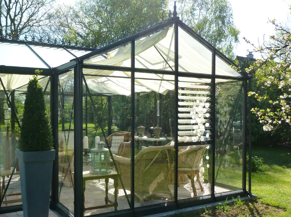 Side of the Janssens Royal Victorian Orangerie with a louver window