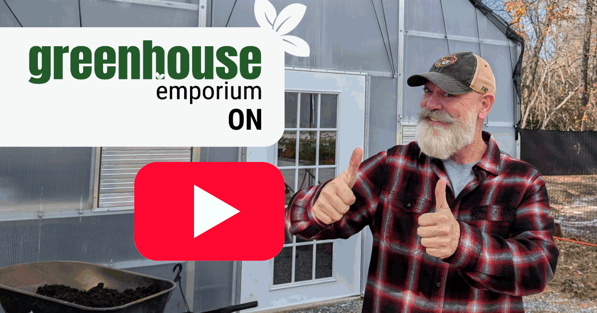 Man holding thumbs up in front of a greenhouse with Greenhouse Emporium and YouTube logo