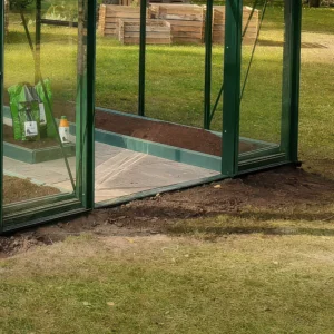 Close up of a Janssens low threshold kit built into a greenhouse foundation