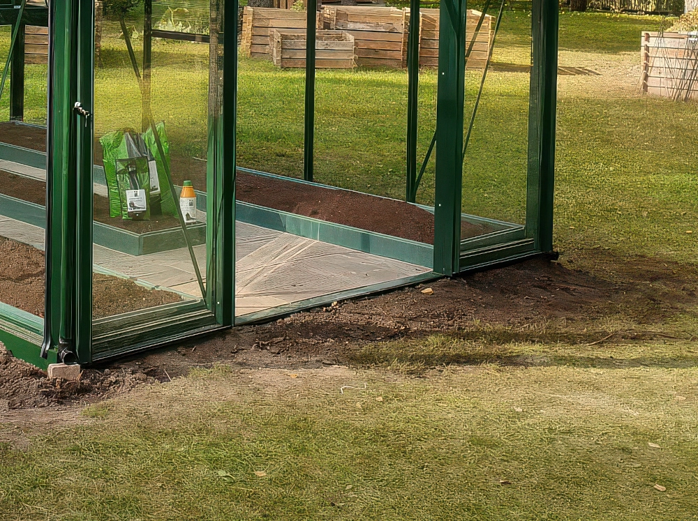 Close up of a Janssens low threshold kit built into a greenhouse foundation