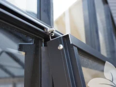 Detail showing the top-hanging hinge of the Janssens Push-Out Side Window