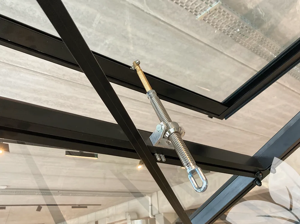 Janssens Spindle Opener installed on a roof vent