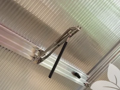 Interior view of the Riga Roof Vent Kit with the auto opener