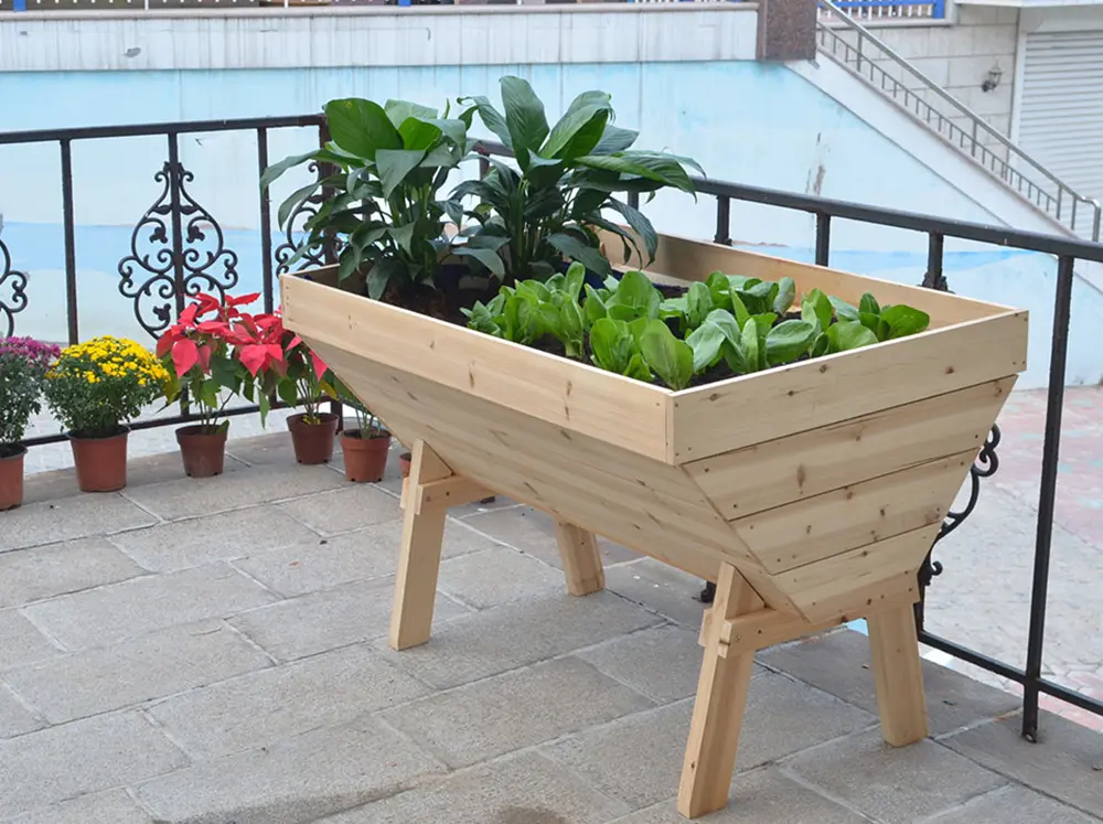 Eden Raised Garden bed by Riverstone Industries on a patio