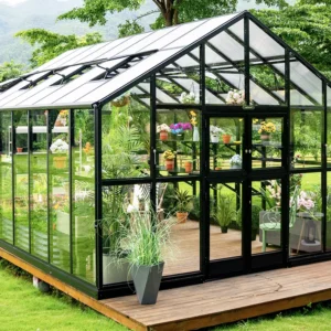 Front of the Vego Grand Victorian Greenhouse with glass on the walls and polycarbonate roof