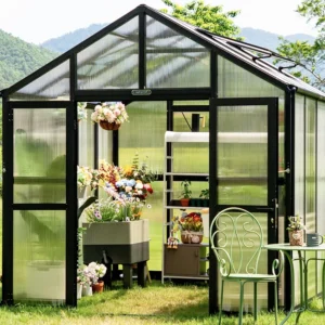 Front of the Vego Victorian 8.5 Greenhouse in a garden