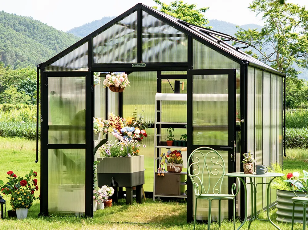 Front of the Vego Victorian 8.5 Greenhouse in a garden