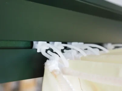 Close-up of hooks used on the Janssens Shade Curtains to attach tehm to the greenhouse framing