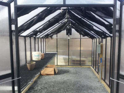 MONT Internal Shade Cloth rolled up sections inside the MONT Greenhouse