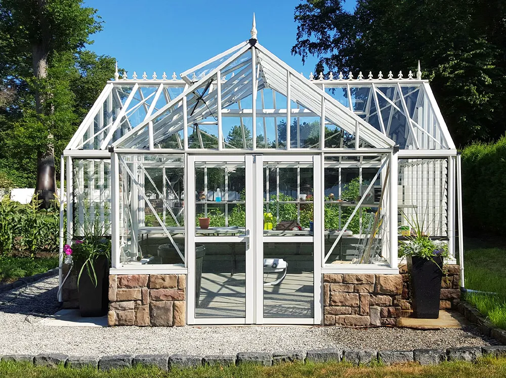 Front of Janssens Antique Orangerie in White with a masonry stem wall
