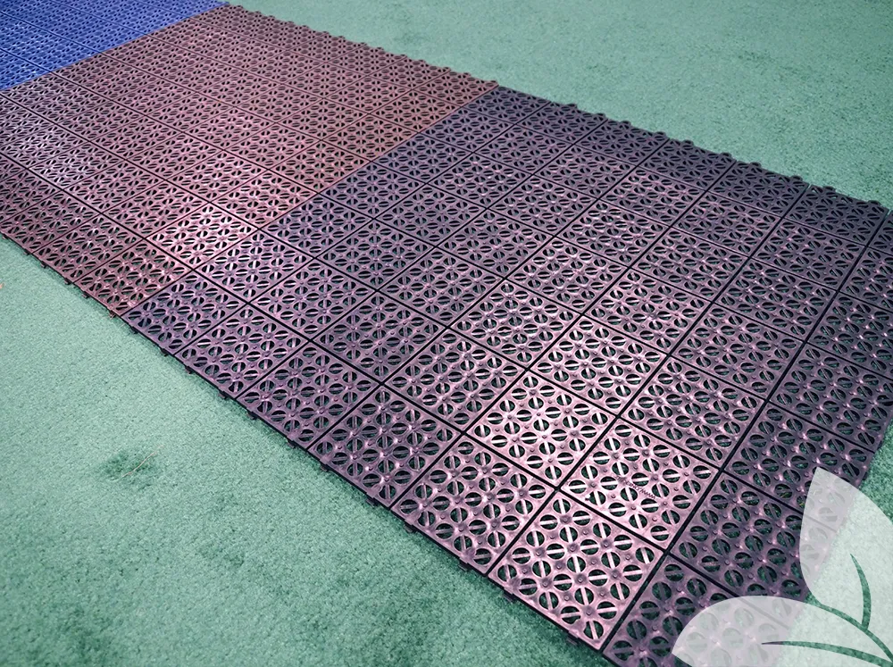 RSI Interlocking Flooring Tiles in different colors on the ground