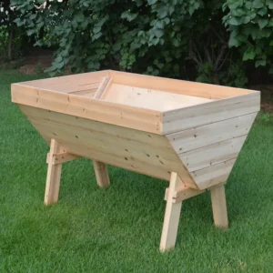 Wooden Eden Deep Root V-Shaped Garden Table on a lawn without soil or plants