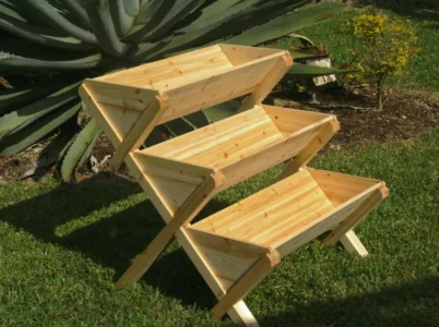 Empty Eden Waterfall Garden Table on a lawn