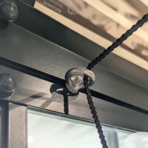 Eye Ring Hook installed in greenhouse with a string running through it