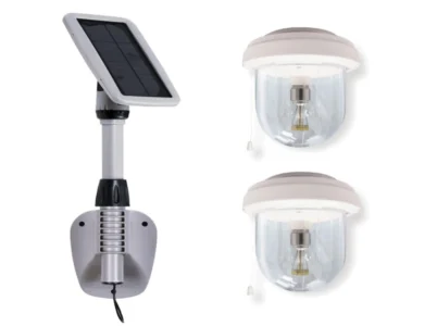 Parts of the Light My Shed Greenhouse Light including the solar panel and two lights