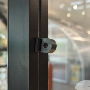 Twist Eye Greenhouse Hook installed in greenhouse channel