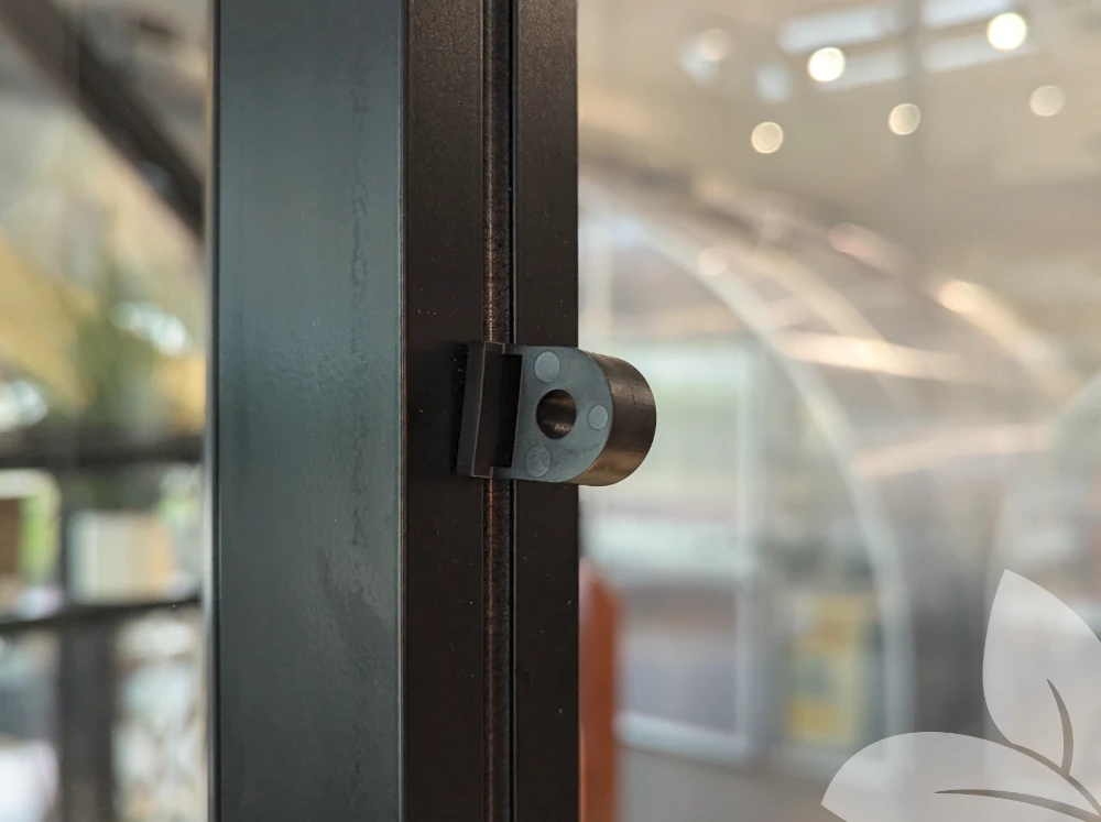 Twist Eye Greenhouse Hook installed in greenhouse channel