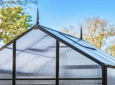 Two Vego Decorative Greenhouse Finials installed on a Vego Greenhouse