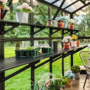 Vego Fixed Shelving (top and bottom) installed in a Vego greenhouse with pots and seed trays