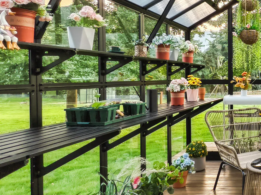 Vego Fixed Shelving (top and bottom) installed in a Vego greenhouse with pots and seed trays