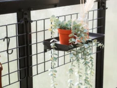 Tray with pot on the Vego Greenhouse Hanging Grid System
