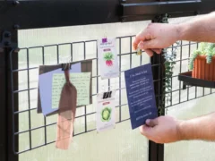 Person clicking an invitation onto the Vego Greenhouse Hanging Grid System