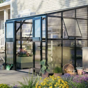 Vego Lean-To Greenhouse along a house wall with doors open