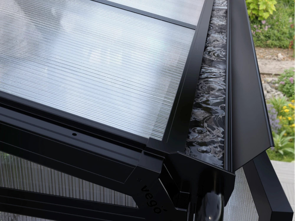 Close-up of the flip-top gutter on the Vego Lean-To Greenhouse