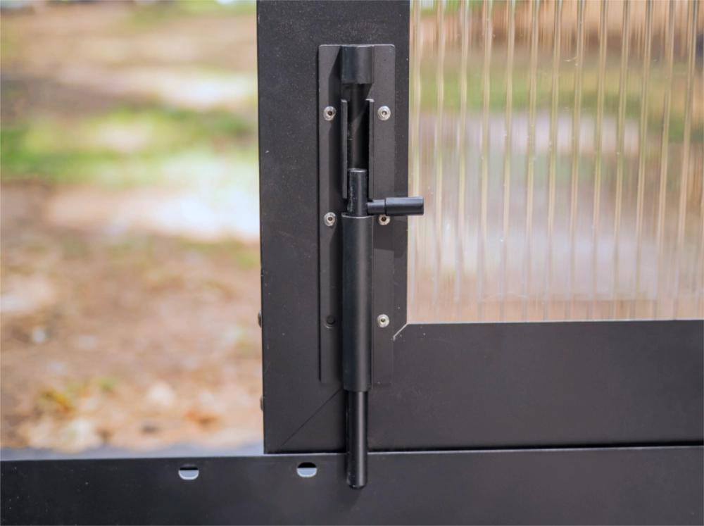 Close-up of the door latch of the Vego Lean-To Greenhouse