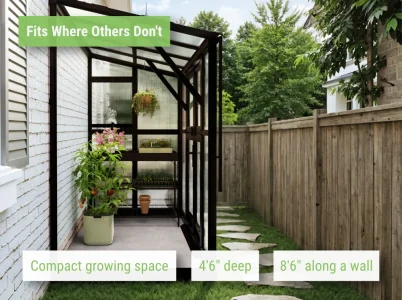 Side view of the Vego Lean-To S Greenhouse set up against the house in a narrow side yard with a fence and path
